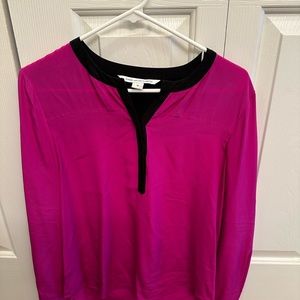 Diane Von Furstenberg silk blouse. Fuchsia with black piping at top. Size 10.